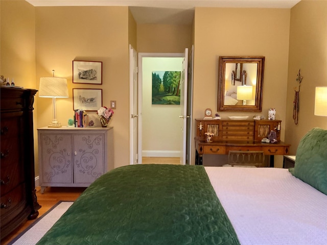 bedroom featuring hardwood / wood-style flooring