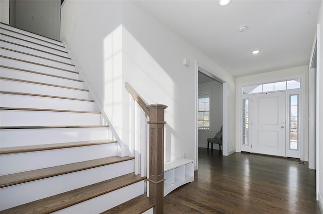 foyer with dark wood-type flooring