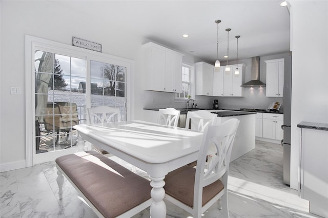 dining area with a wealth of natural light