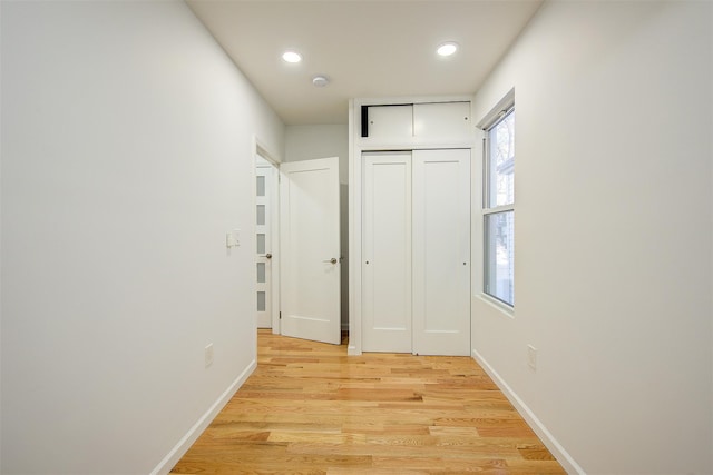 hallway featuring light hardwood / wood-style flooring