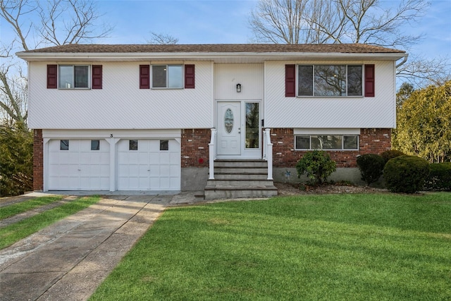 raised ranch with a front lawn and a garage