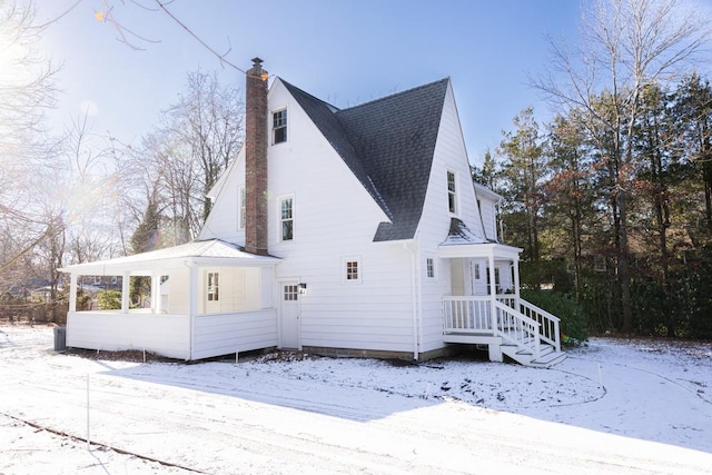 view of snow covered property