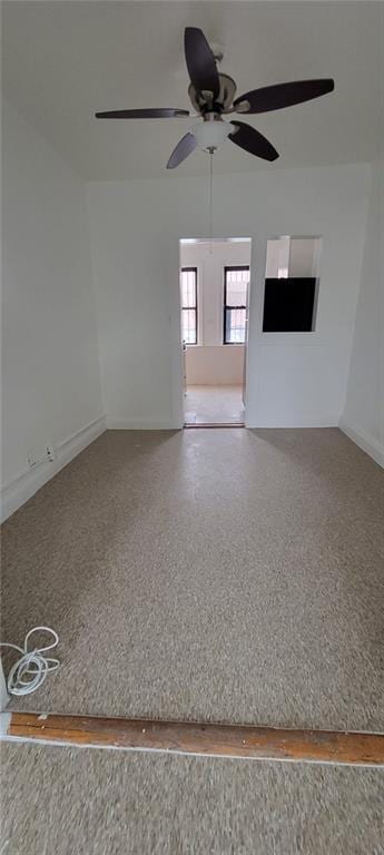 empty room featuring ceiling fan