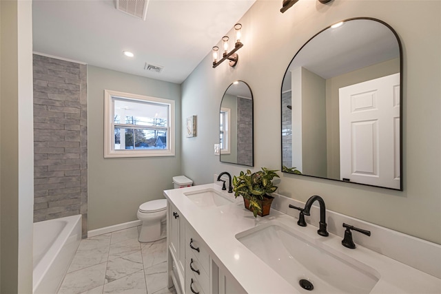 full bathroom featuring vanity, toilet, and shower / bath combination