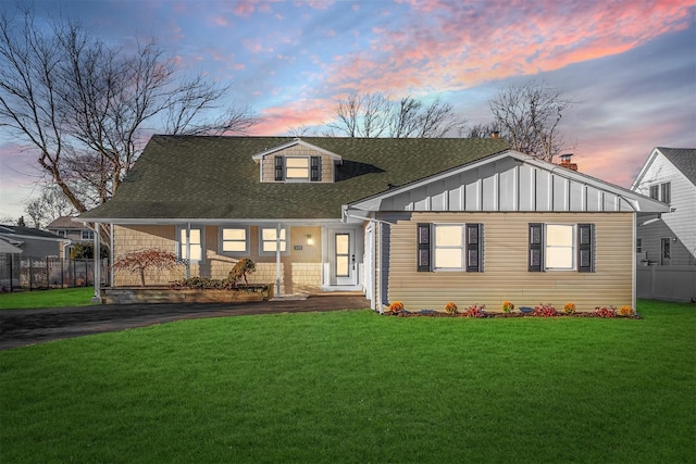 view of front of house with a lawn