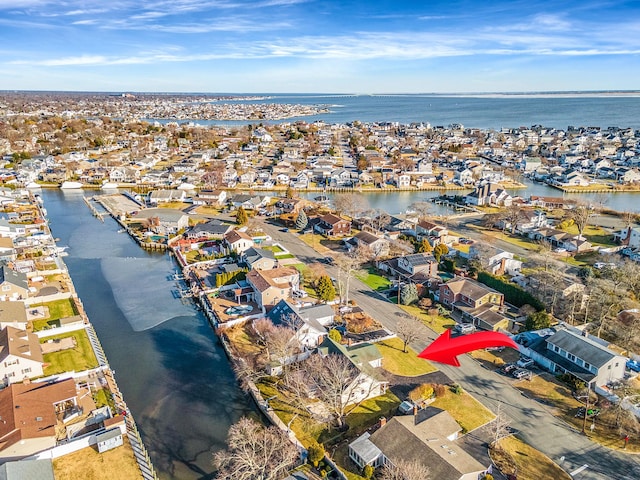 aerial view featuring a water view