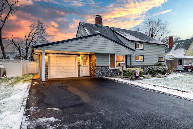 view of front of home with a garage