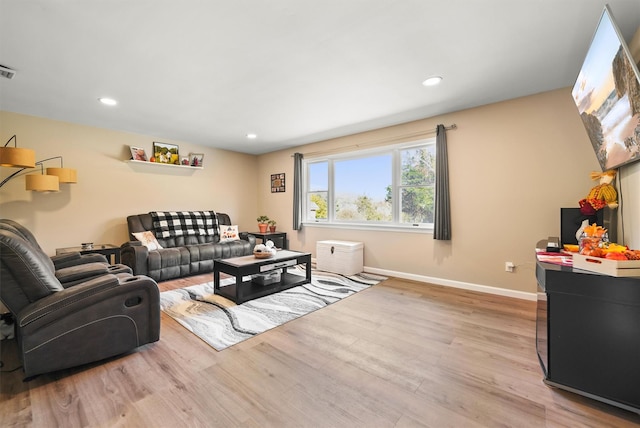 living room featuring light wood-type flooring