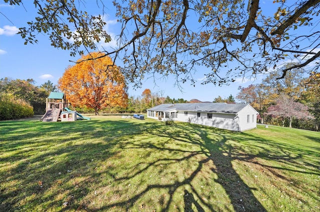 view of yard with a playground