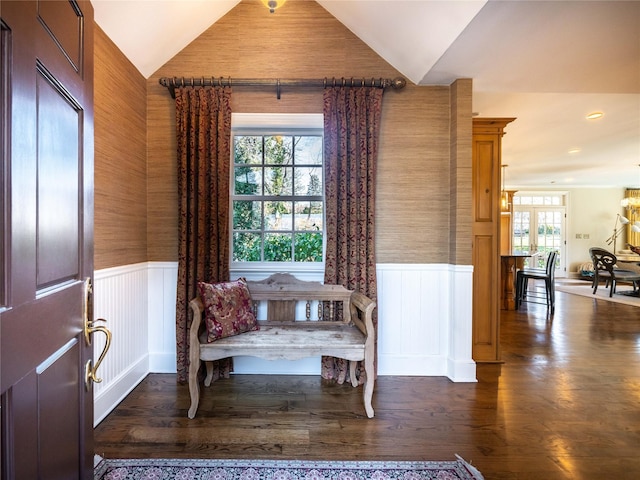 sitting room featuring vaulted ceiling and dark wood-type flooring