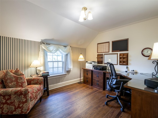 office with lofted ceiling, dark hardwood / wood-style floors, an inviting chandelier, and ornamental molding