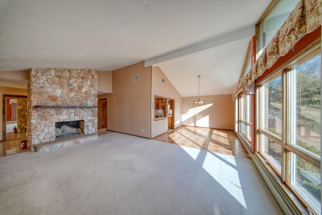 unfurnished living room with a stone fireplace, lofted ceiling with beams, and light carpet