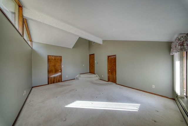 carpeted empty room with baseboard heating and lofted ceiling with beams