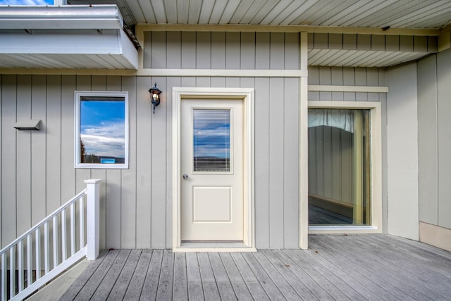 doorway to property with a wooden deck