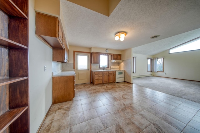 kitchen with sink, a baseboard radiator, electric stove, and light tile patterned floors