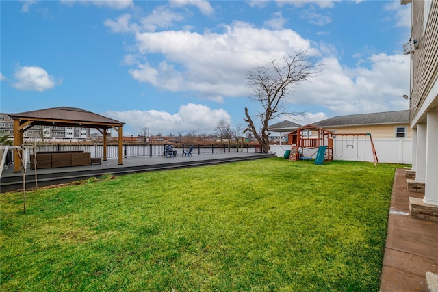 view of yard with a playground and a gazebo