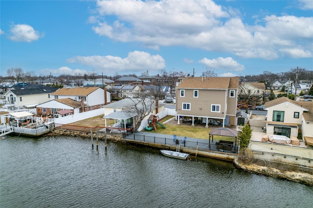 drone / aerial view featuring a water view