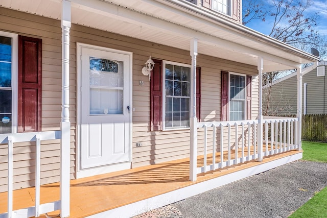 entrance to property featuring a porch