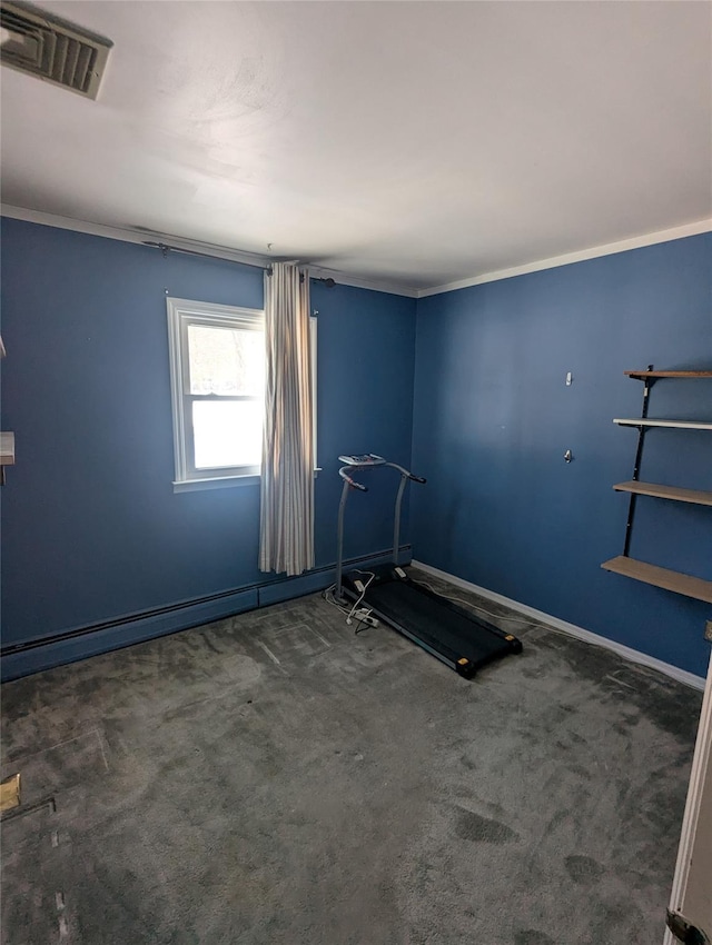 exercise room featuring dark carpet and crown molding