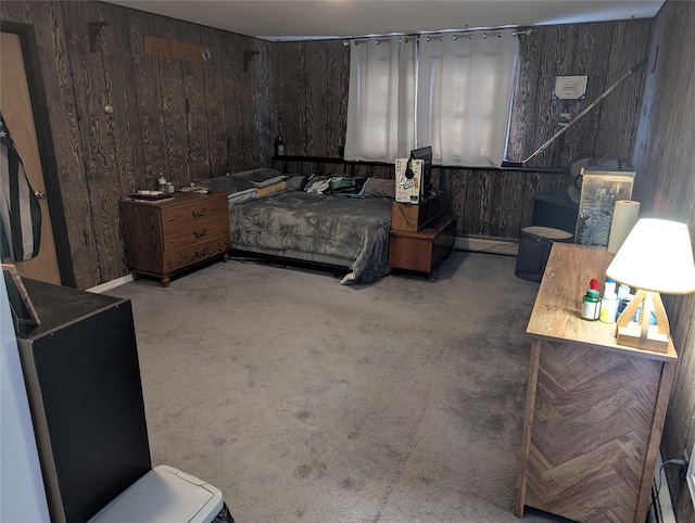 carpeted bedroom with wood walls