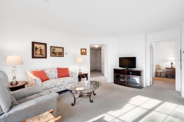 living room with light colored carpet