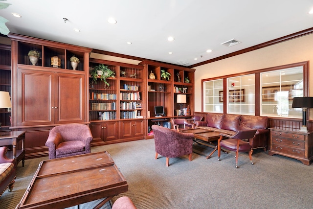 carpeted living room featuring crown molding