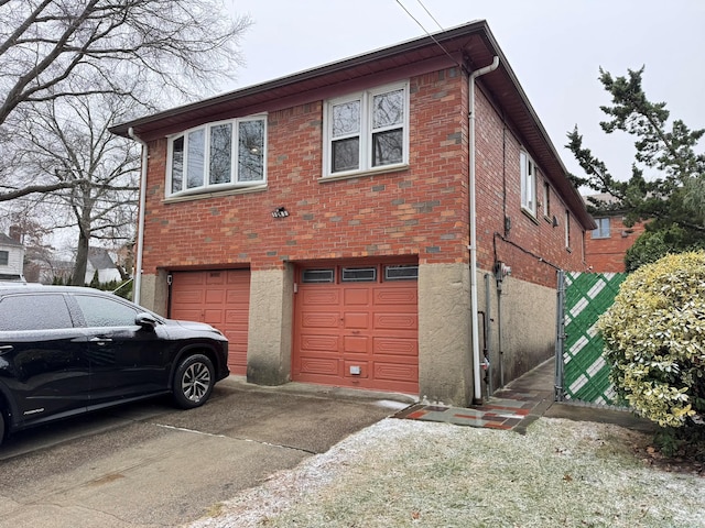 view of property exterior featuring a garage