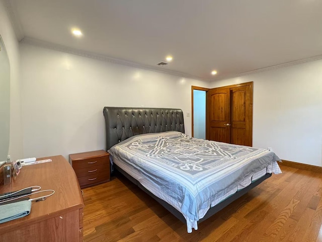 bedroom featuring dark hardwood / wood-style floors