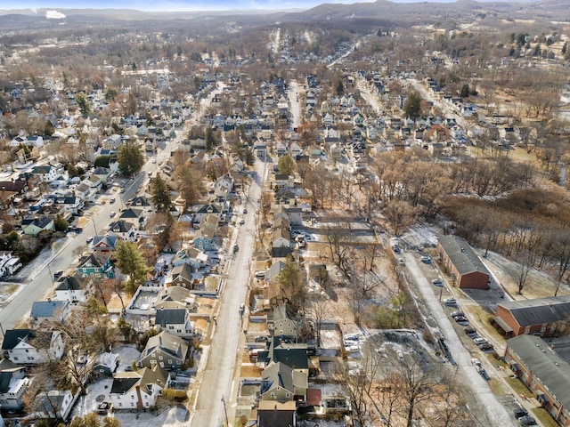 birds eye view of property featuring a mountain view