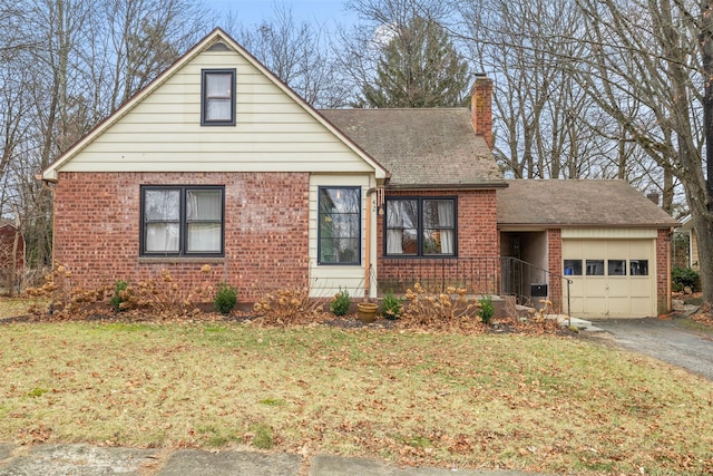 view of front facade with a front lawn and a garage