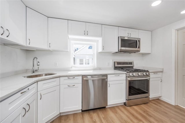 kitchen with white cabinets and stainless steel appliances