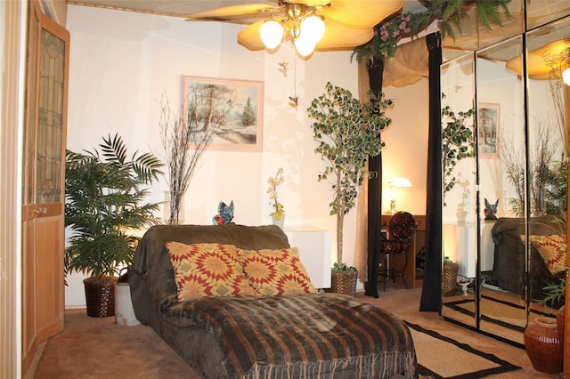 bedroom with carpet, radiator, and ceiling fan