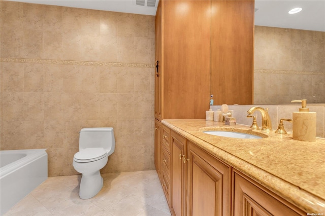 bathroom with tile patterned floors, toilet, and tile walls