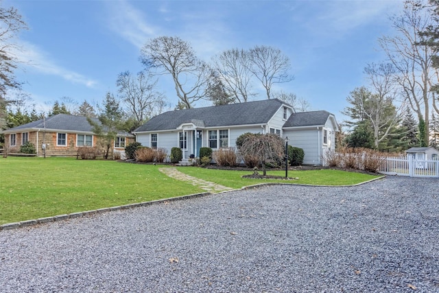 ranch-style home with a front yard