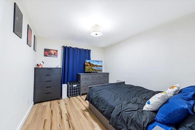 bedroom featuring wood-type flooring