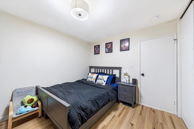 bedroom featuring light wood-type flooring