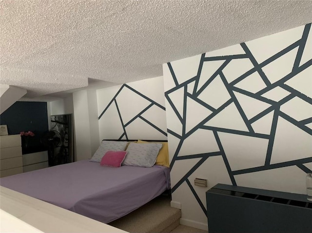 bedroom with a textured ceiling