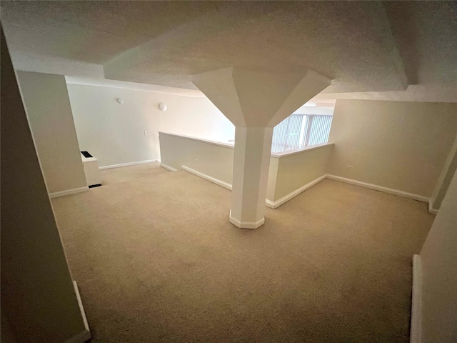 bonus room featuring carpet