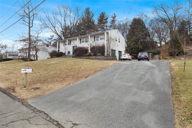 view of front of home with a front yard