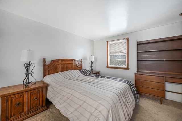 bedroom with light carpet