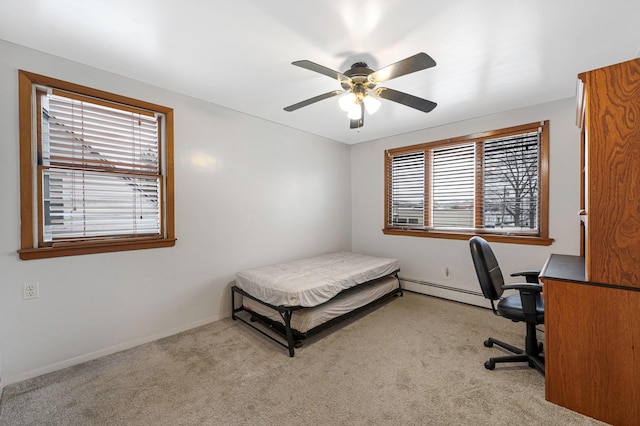 bedroom featuring ceiling fan, baseboard heating, and light carpet