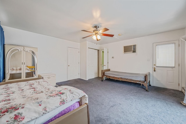 carpeted bedroom with an AC wall unit and ceiling fan