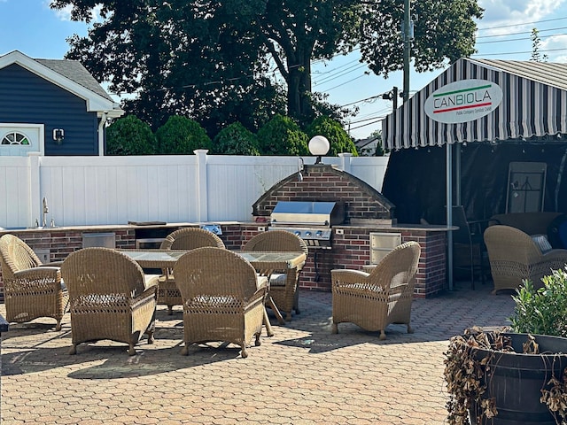 view of patio / terrace with a grill and area for grilling