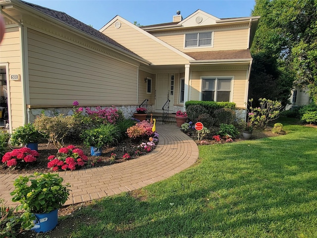 view of front of house featuring a front yard