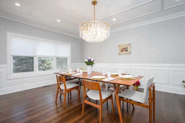 dining space with dark hardwood / wood-style floors, crown molding, and a chandelier