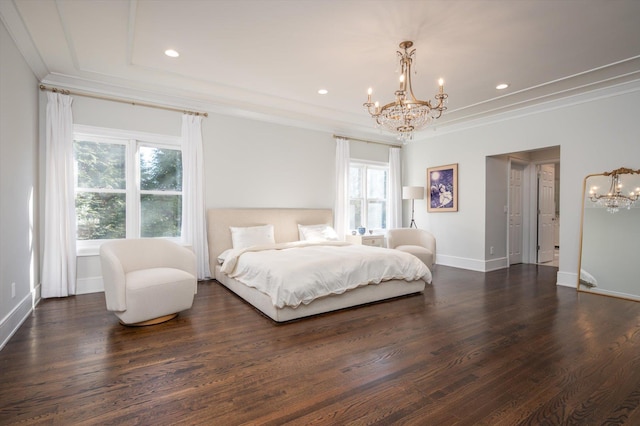 bedroom with dark wood-type flooring, a tray ceiling, multiple windows, and ornamental molding