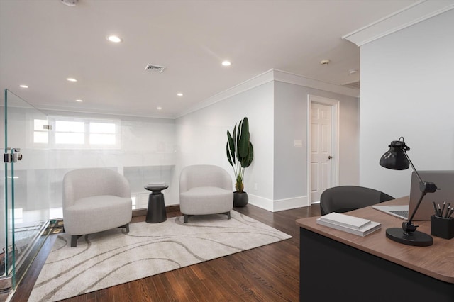 office area featuring dark hardwood / wood-style flooring and crown molding