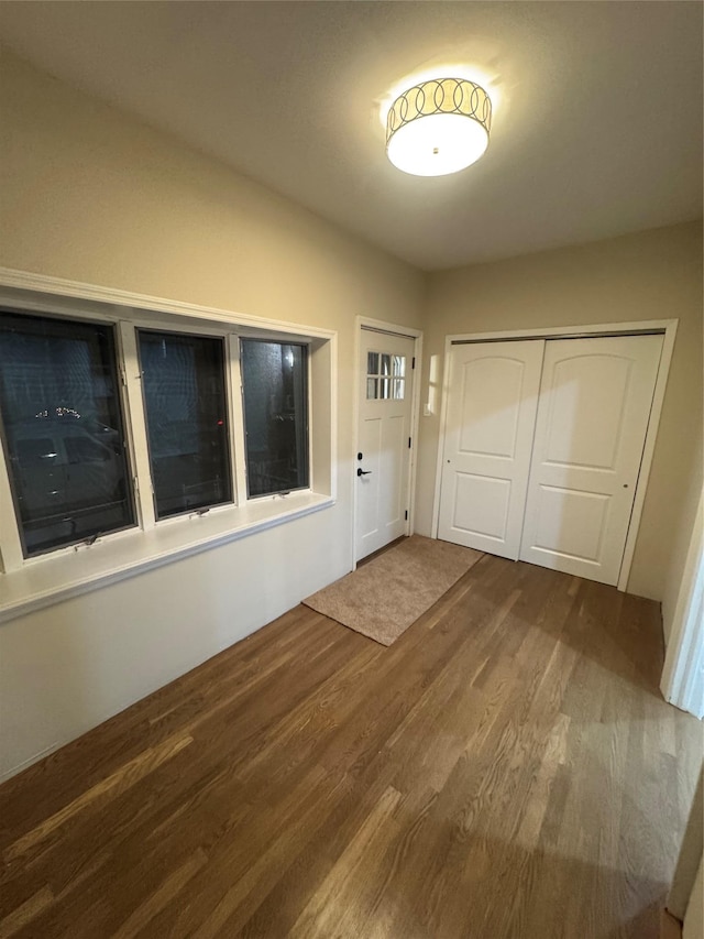 foyer entrance with hardwood / wood-style floors