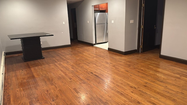 empty room with wood-type flooring