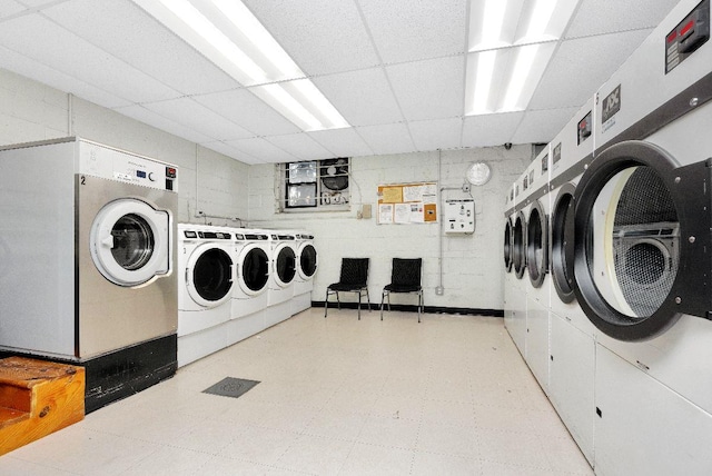 washroom with washing machine and dryer